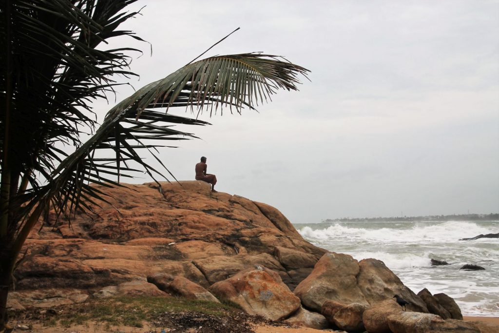 Fisherman watching the ocean