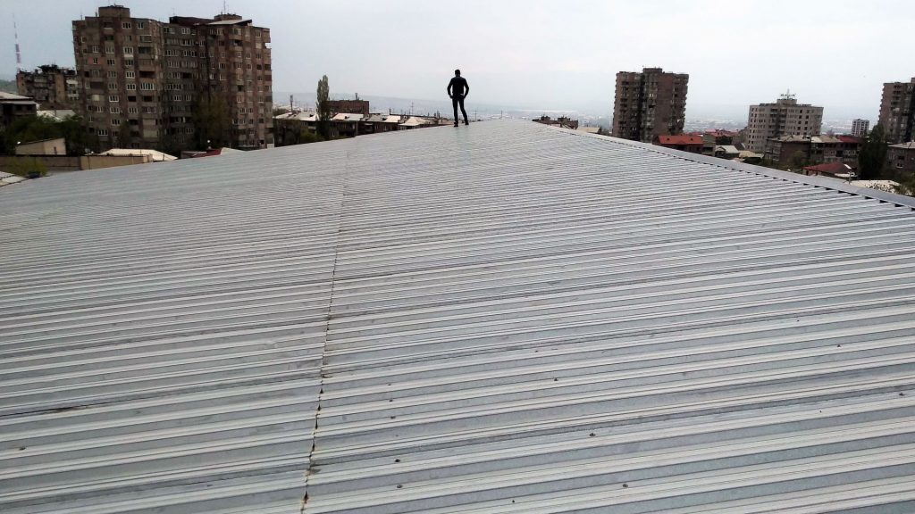 The rooftop of a shopping mall in comparibly good shape